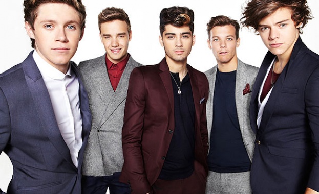 One Direction - най-продаваните британски музиканти за 2013 г.